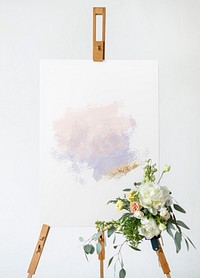 A craft painting on a canvas standing on a easel mockup