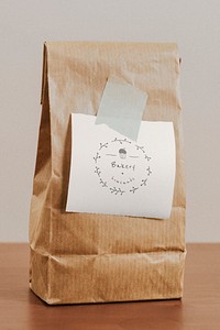 Brown paper bag with a white notepaper mockup