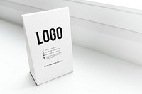 White standing sign mockup in a window