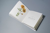 Mid fold book mockup with floral illustration