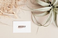 Business card decorated with woven and dried grass mockup
