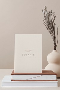 Botanic flyer on the top of books