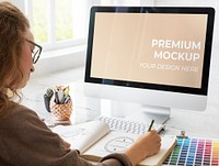 Female designer using a computer mockup