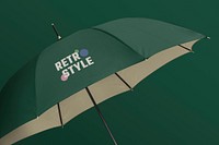 Green umbrella mockup psd in retro design