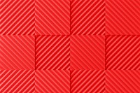 Red acoustic foam background, soundproofing wall panel