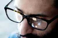 Man wearing eyeglasses, closeup