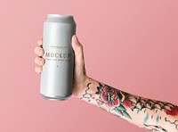 Hand holding a white aluminum can psd mockup