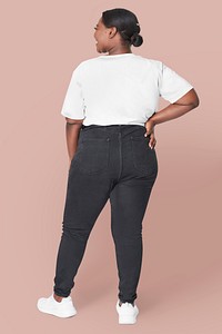 Women's white t-shirt and jeans plus size fashion mockup psd studio shot