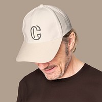 Beige cap psd mockup with C logo men&rsquo;s apparel close up