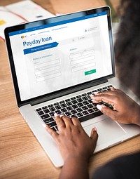 Woman applying for a loan application on a laptop mockup during a coronavirus pandemic