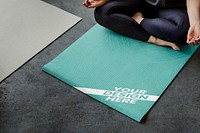 Woman meditating in a yoga class