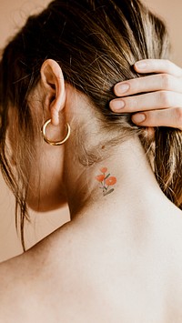 Flower tattoo iPhone wallpaper, woman's neck photo