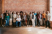 Diverse people in brick wall office