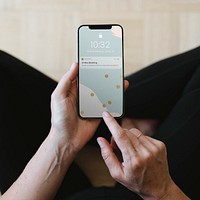 Woman reading a message from the bank on a mobile phone mockup