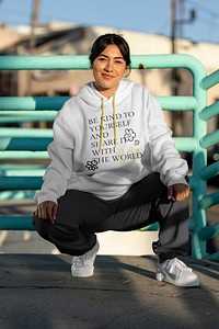 Streetwear apparel mockup, psd hoodie top, young woman at the Venice beach