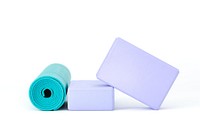 Two purple yoga blocks, one teal yoga mat.