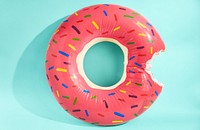 Inflatable pink donut pool toy.