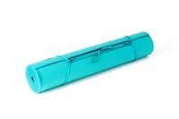 Rolled up and tied teal yoga mat.