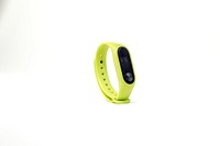 Lime green Fitbit fitness tracker. 29 JUNE 2023 - BANGKOK, THAILAND