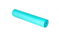 Rolled up teal yoga mat on its side.