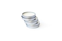 Stack of three beard balms in round silver tins.