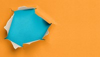 Ripped paper hole background, orange design