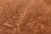 Brown sparkly background, leaf shadow border