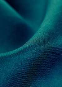 Dark green fabric background