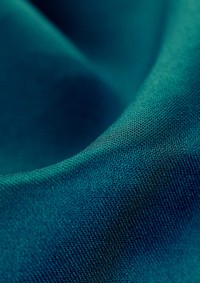 Dark green fabric background