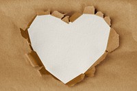Heart torn paper hole