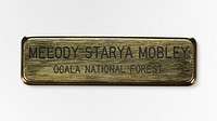 US Forest Service Ocala National Forest name badge worn by Melody Starya Mobley. Original public domain image from The Smithsonian Institution. Digitally enhanced by rawpixel.