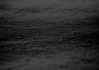 Aesthetic black sand textured background