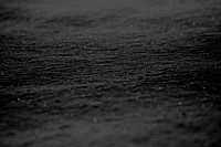 Abstract black sand textured background