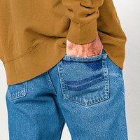 Man put his hand into back pocket of jeans mockup
