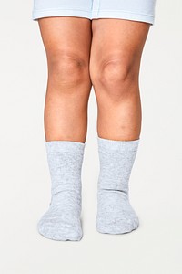 Kid's white socks mockup psd in studio