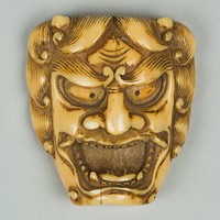 Netsuke of Mask of a Man with Open Mouth and Curly Hair