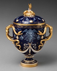 Lidded vase with Medusa decoration and snake handles