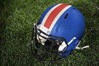 Blue football helmet on field