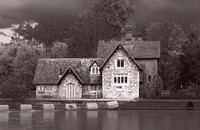 River Medway AllingtonHouse associated with lock. Mid C19. Random galletted ragstone with ragstone quoins, gault brick stacks and plain tile roof. T-plan with head of T at right angles to lane and stem at right angles to river. Further wing forming single storey store and possibly office to rear of and recessed from gable end of stem, parallel to and projecting beyond head of T. Elevation to Lane: right section (head) 2 storeys, on a stone plinth which exists only at the gable end. Carved bargeboards with pendant, crested ridge tiles and central corbelled, filletted ridge stack. 2-light first-floor casement with smaller light above in chamfered stone architraves under stepped hood-mould with label stops. 3-light casement on ground floor with 3 top lights and relieving arch over. Left section (stem) set lower; one storey and garret. No windows. Central, slightly projecting, gabled porch with carved bargeboards and pendant. Contains chamfered stone architrave of 2 orders, the inner deeply recessed and now containing a 3-light window in the arch with ragstone below. Another door adjoins immediately to right in angle with right section, set under porch formed by projection of slope of roof supported on stone brackets. Ribbed and boarded door reached up flight of steps starting level with right gable, with short octagonal pillar on left side. Elevation to river; stem of T has projecting eaves with plain bargeboards and pendant. Store wing one storey and attic with carved bargeboards and pendant to left gable. Dormer at right end. Pointed arched door to attic in gable. Arched doorway with ribbed and boarded door to centre of main elevation in slightly projecting porch with carved bargeboards and pendant.