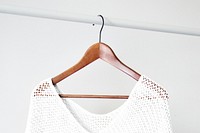 Knitted poncho mockup, wooden hanger psd