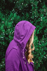 Woman in purple hoodie windbreaker