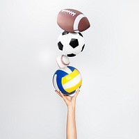 Hand holding sports balls