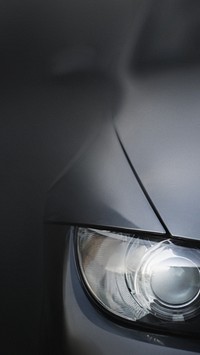 Car's headlight closeup mobile wallpaper