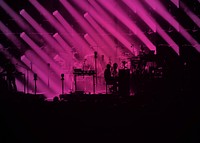 Silhouette concert, pink light background