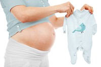 Pregnant woman showing blue baby romper
