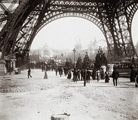 Universal Exhibition of 1900: characters under the Eiffel Tower, and perspective of the Champ-de-Mars, Paris (1895-1905), vintage photograph. Original public domain image from Carnavalet Museum. Digitally enhanced by rawpixel. Digitally enhanced by rawpixel.