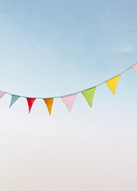 Colorful bunting background, blue sky image