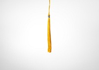 Yellow tassel background, graduation cap image