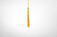 Yellow tassel background, graduation cap image