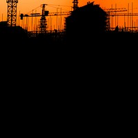 Construction silhouette, orange background